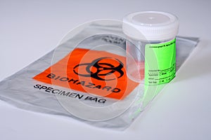 Biohazard specimen bag and cup