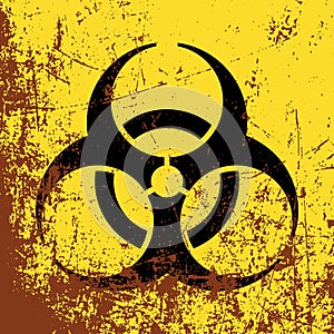 Biohazard symbol on yellow background.