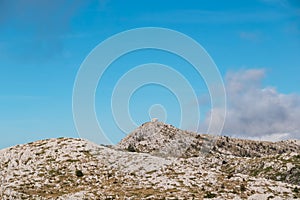 Biokovo - Panoramic view of alpine cottage near mountain peak Vosac in Biokovo nature park, Makarska, Dalmatia, Croatia