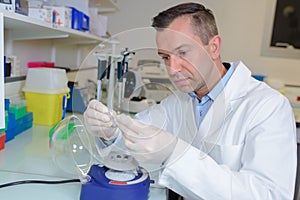 Biological technician preserving sample