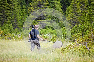 Biologist exploring a bog