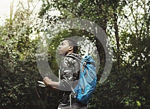 Biologist in a forest exploring