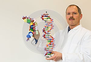 Biologist shows DNA and mRNA