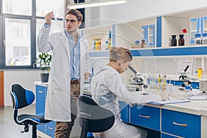 Biologists working in lab