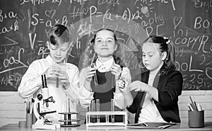 Biology equipment. students doing biology experiments with microscope in lab. Little kids learning chemistry in