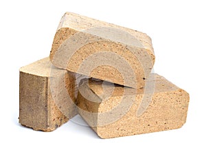 Biomass briquettes are a biofuel substitute to coal and charcoal photo