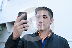 Biometric facial recognition on smartphone. Unlock smartphone as photo