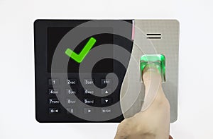 Biometric Fingerprint Scanner. Thumb on fingerprint. access control verified. successful entrance.