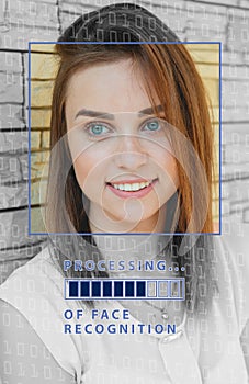 Biometric verification. young woman with status bar. The concept of a new technology of face recognition.