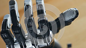 Bionic arm. Innovative robotic hand made on 3D printer. Futuristic technology. Timelapse.