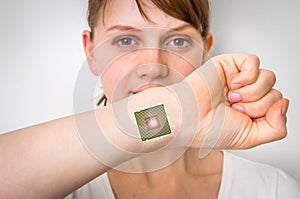 Bionic chip processor implant in female human body photo