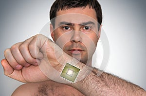 Bionic microchip processor inside male human body photo