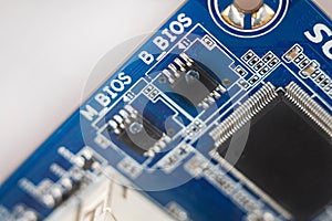 BIOS chips close-up macro on the motherboard of the computer