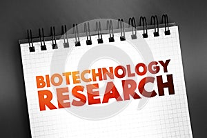 Biotechnology Research text on notepad, concept for presentations and reports