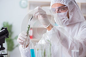 The biotechnology scientist chemist working in lab