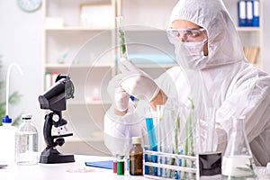 The biotechnology scientist chemist working in lab