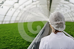 Biotechnology woman engineer with a clipboard and