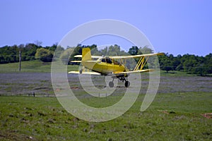 Biplane Crop Duster in Action