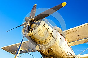 Biplane standing at sunset