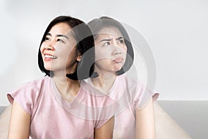 bipolar disorder , double personality Asian woman in difference emotional photo