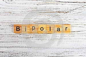 BIPOLAR word made with wooden blocks concept