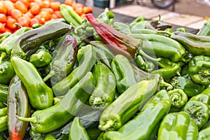 Fresh green chilis for sale at the outdoor souk in Bir al Haffay