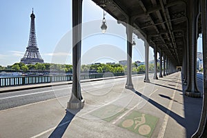 Bir Hakeim bridge and Eiffel tower in a sunny day, nobody in Paris, France