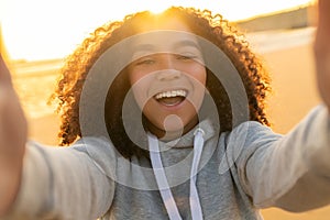 Biracial African American Girl Teenager Selfie on Beach at Sunset