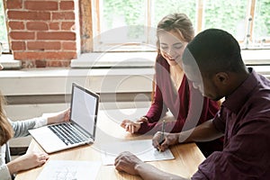 Biracial couple signing contract at meeting, buying new house, m