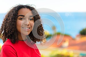 Biracial Mixed Race African American Teen Girl Smiling by the Sea