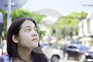 Biracial teen girl tourist along streets of Phnom Pehn, Cambodia