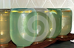 Birch sap rolled into three-liter glass jars.