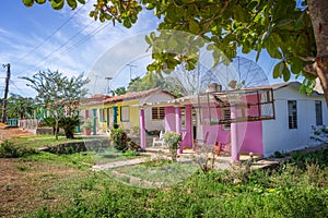 Bird cage and colorful houses in Vinales