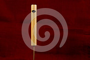 Bird Call Whistle Isolated on a Red Background