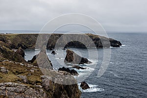 Bird cliffs during rainy day in the Isle of Harris, Scotland, United Kingdom
