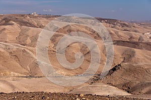Bird eye view on a asphalt road in Judaean Desert, Israel.