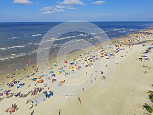 Bird eye view beach shoreline on sunny Teas summer day