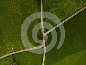 a bird - eye view of an intersection in a grass area