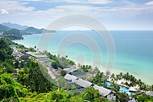 Bird eye view of tropical landscape with white sand beach, coconut palm trees and turquoise tropical sea on Koh Chang island
