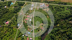 Bird-eye view of village Mulu with roads and houses near Gunung Mulu national park. Borneo. Sarawak.