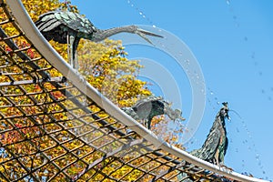 Bird fountain at gardens of Schwetzingen palace in Germany during sunny summer day