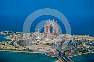 Bird`s eye and aerial drone view of Abu Dhabi city from observation deck