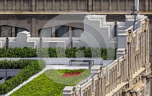 Bird's eye aerial view of a rooftop garden on an ornate roof of a skyscraper in Midtown Manhattan New York