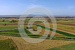 Bird\'s eye view of agricultural fields, agronomic industry. Aerial drone view