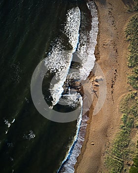 a bird's eye view of a beach on the coast