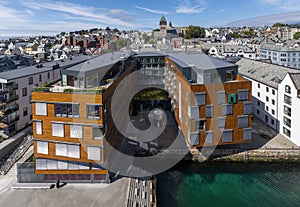 Bird's eye view of beautiful buildings of Alesund, Norway on a sunny day