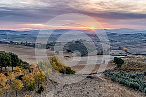 Bird's-eye view of Belvedere before sunrise. Pitoresque region Tuscany. Italy.