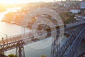 Bird`s-eye view of Dom Luis I bridge, Douro river and Ribeira in Porto