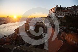 Bird`s-eye view of Douro river in old downtown of Porto at sunset