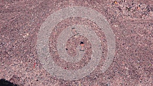 Bird`s eye view of a garbage dump where machinery equals mountains of household waste, Ukraine. Ecological problem